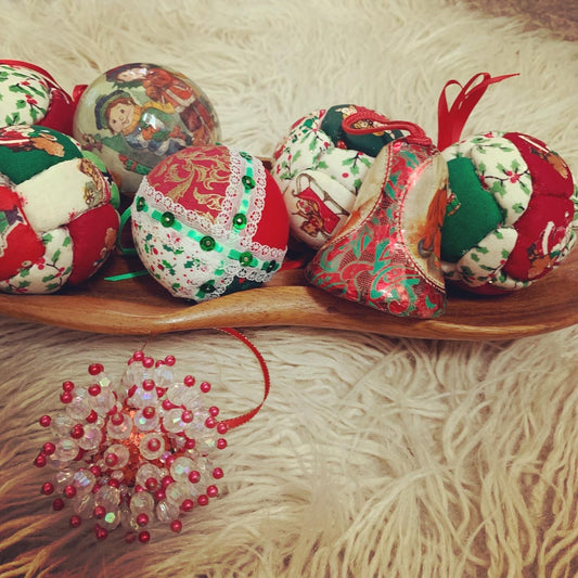 Mixed vintage 80s era Christmas tree ornament decorations, some handmade, quilted, beaded