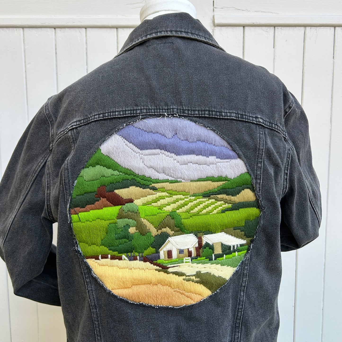 Black Denim Jacket Feat. Landscape, Rolling Hills, Verdant Fields, & Quaint Farm House - Reclaimed Vintage Embroidery Denim Jacket, Wearable Art